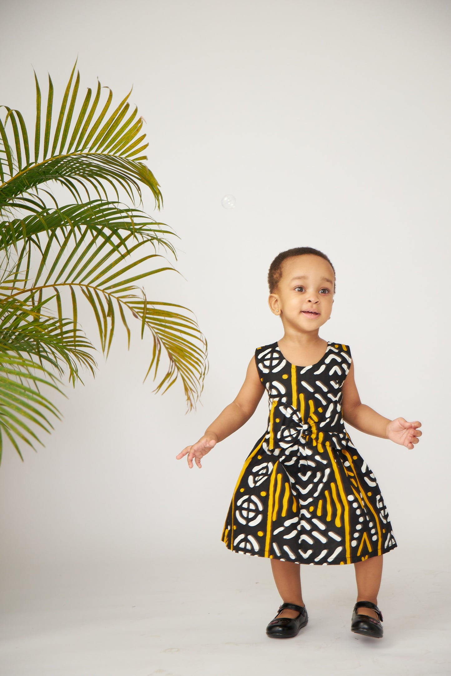 Baby Black Aztec Print Bow Front Baby Doll Dress